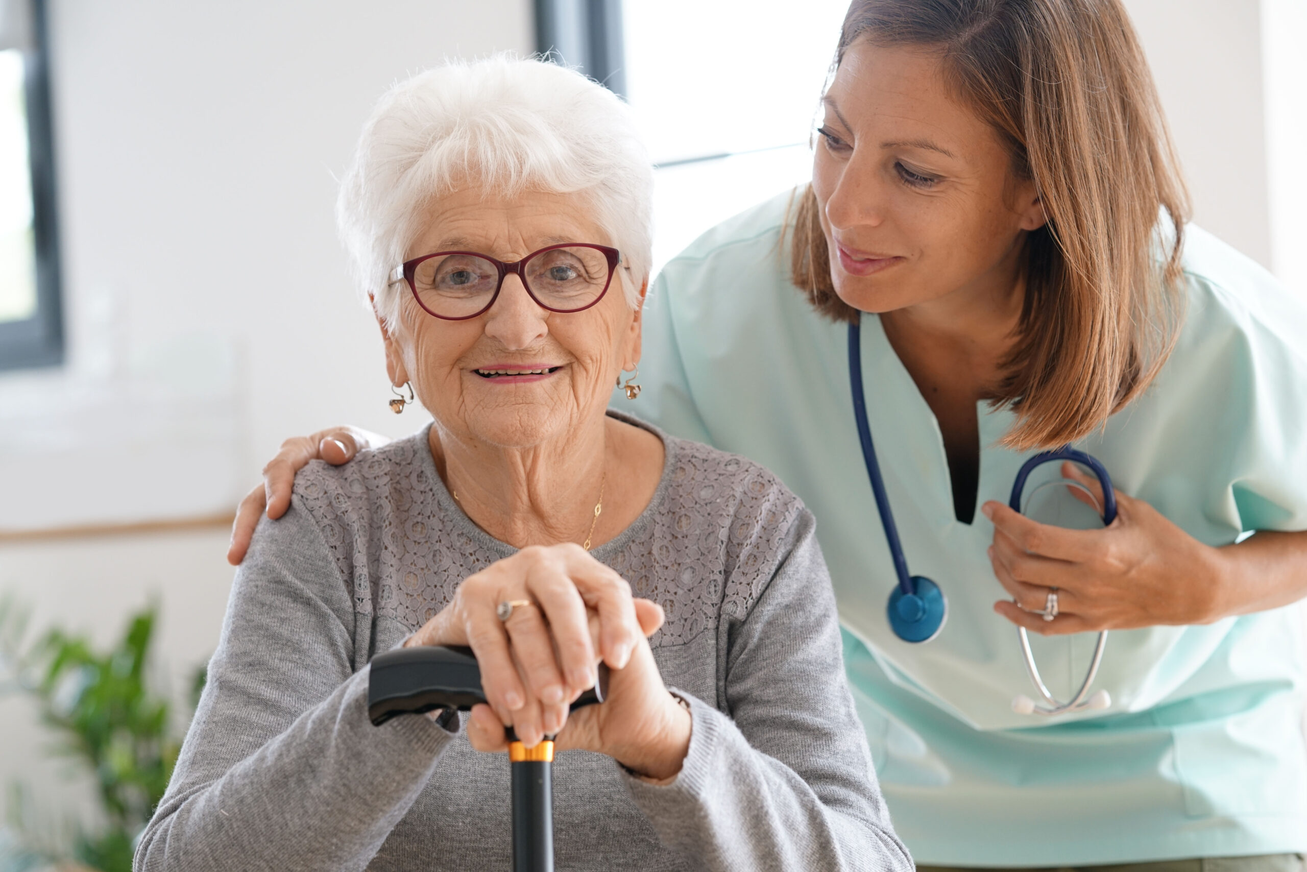 old lady with nurse nursing home