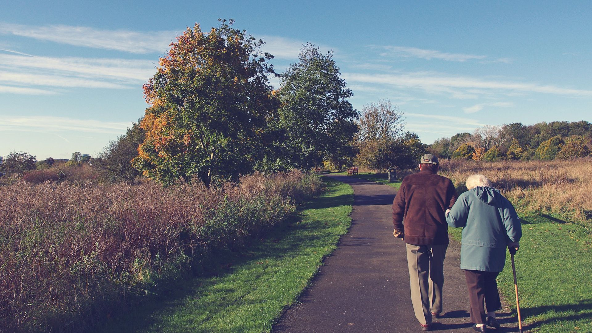 elderly couple walking