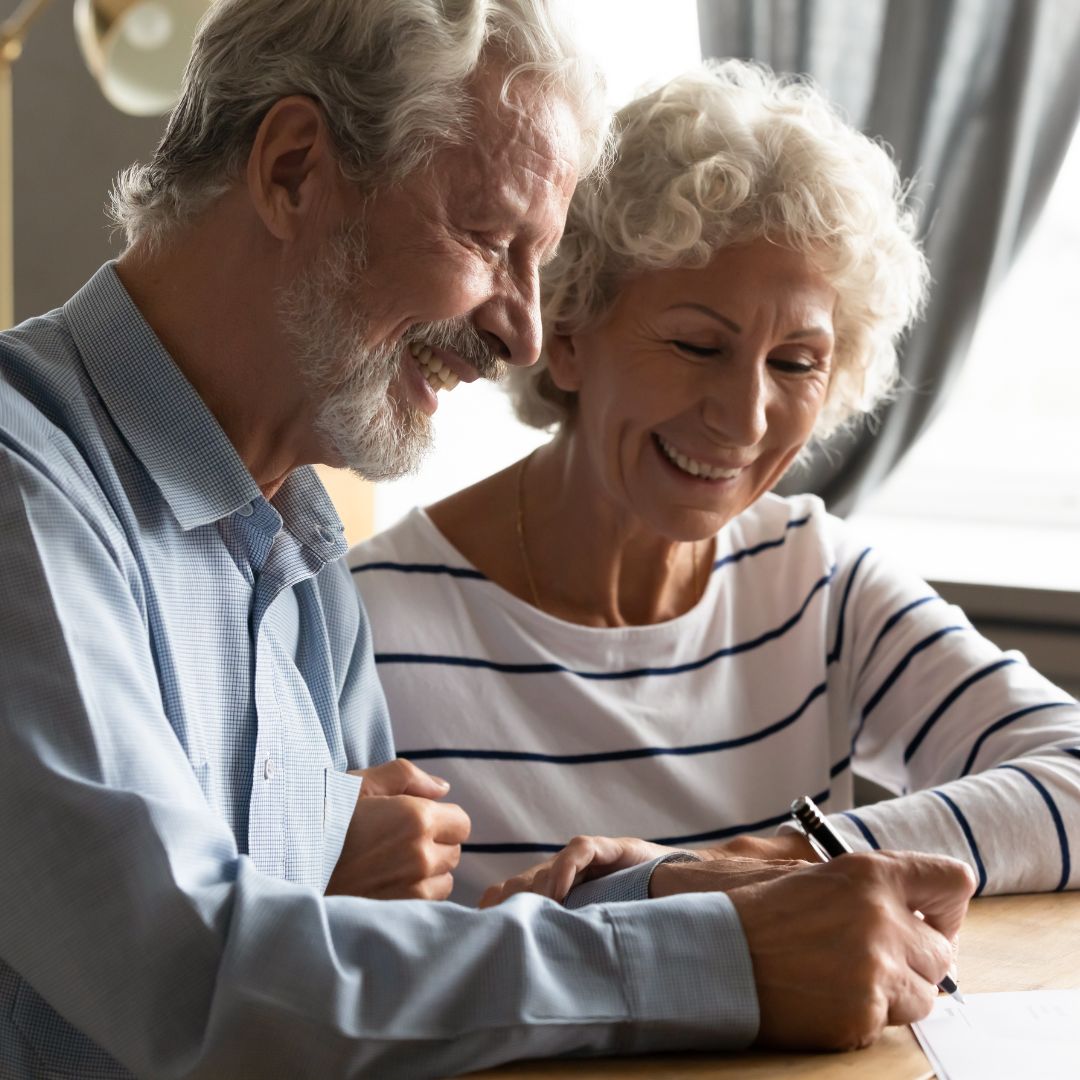 older couple looking over paperwork